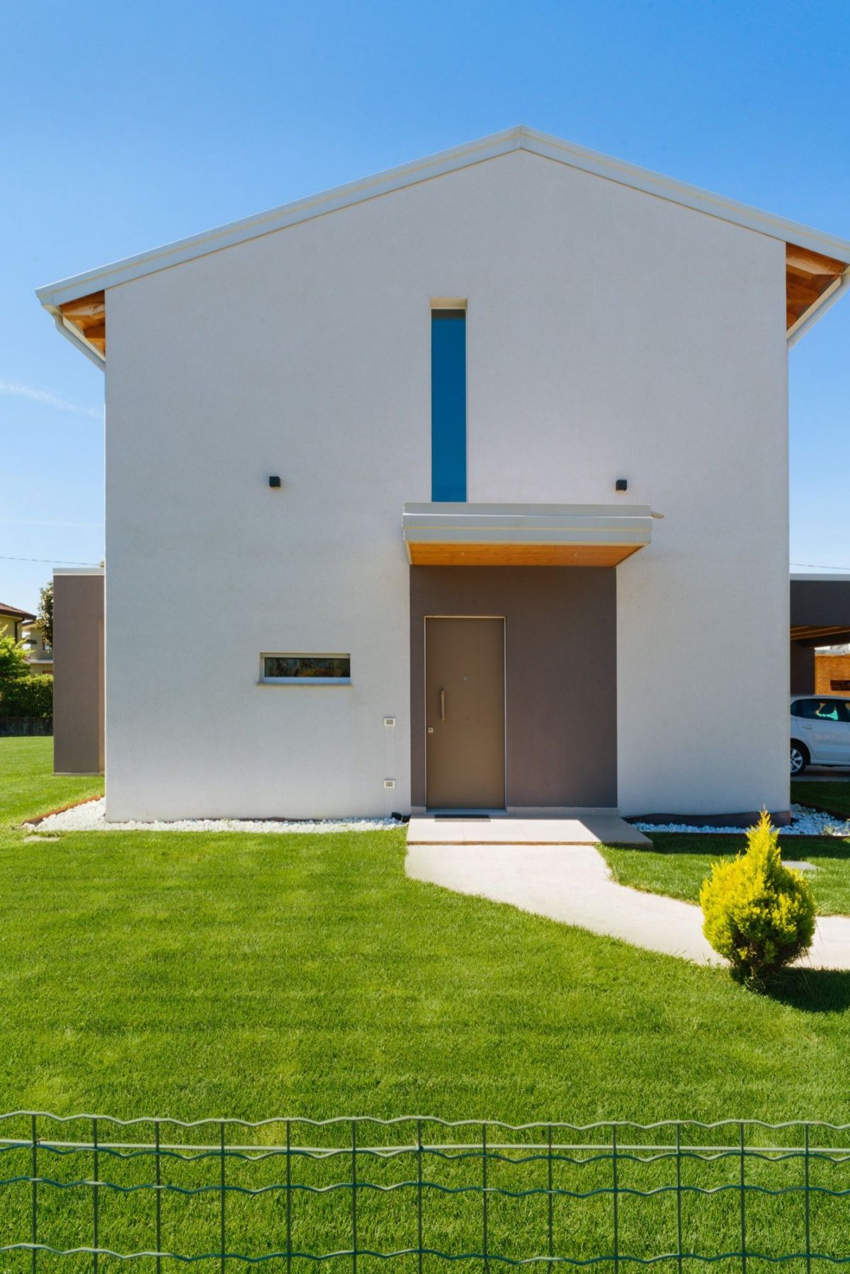 Case in legno Evoluthion CASA IN LEGNO CON AMPIO PORTICATO