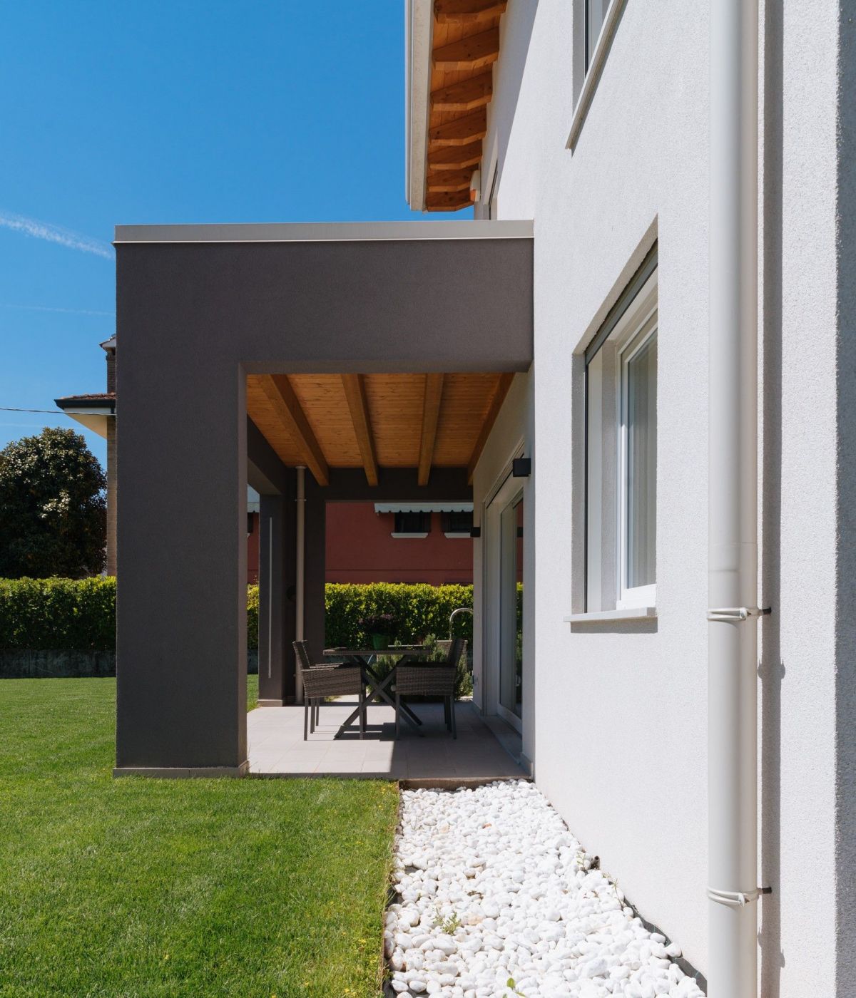 Case in legno Evoluthion CASA IN LEGNO CON AMPIO PORTICATO