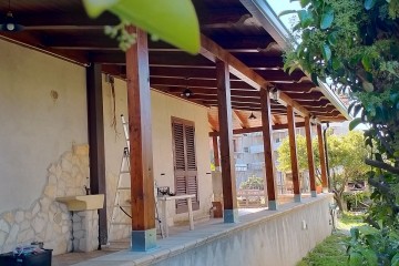 Modello Ampliamento in Legno Terrazzo coperto in legno lamellare di Serramenti Rigano' Group